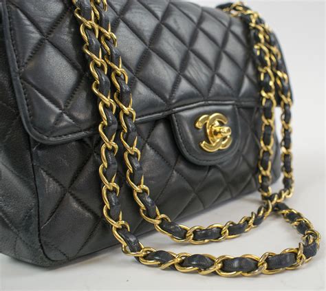 black chanel bag gold chain|chanel black classic quilted handbag.